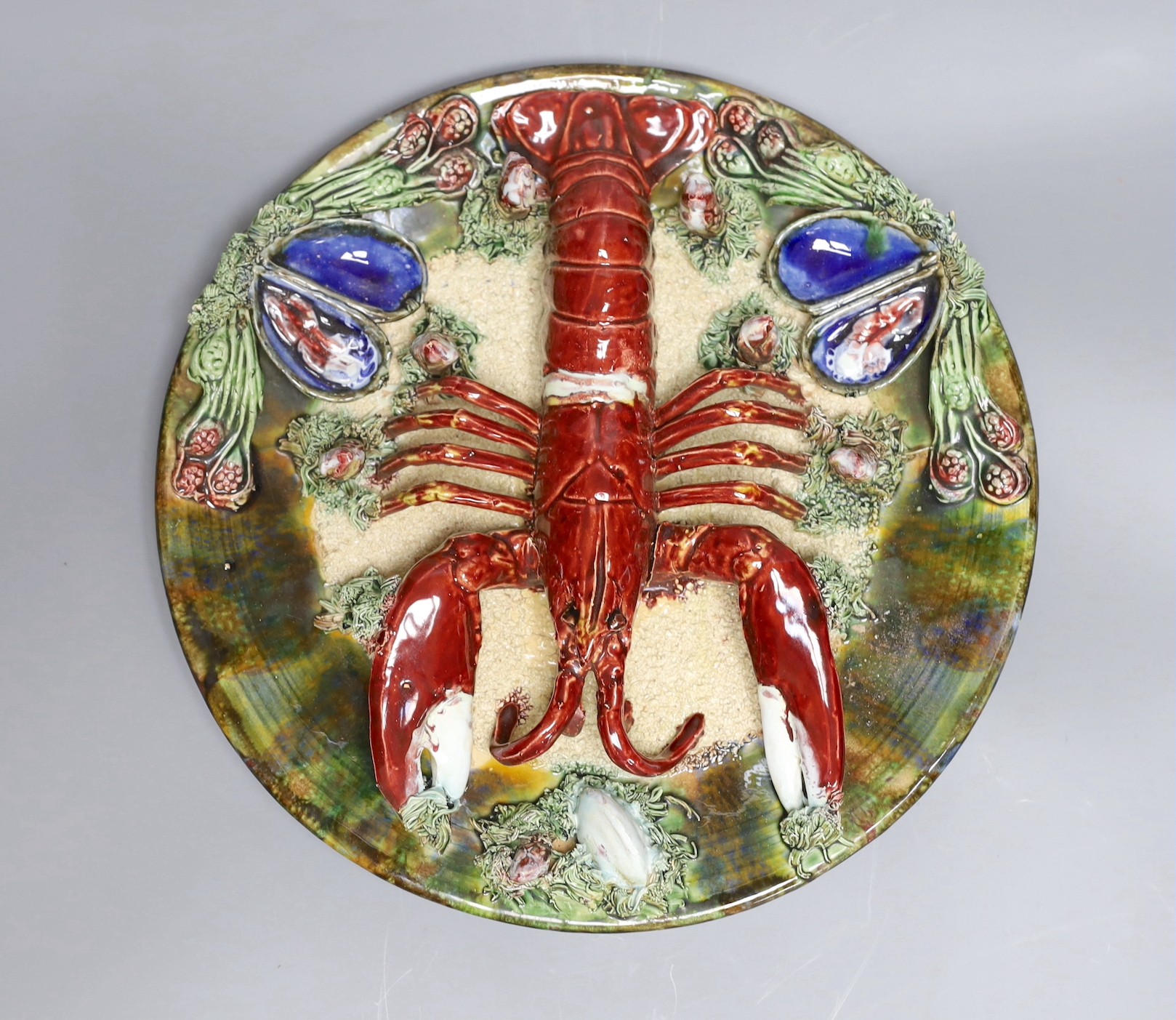 A Palissy ware charger - Caldas type ‘lobster’ dish, 31cm